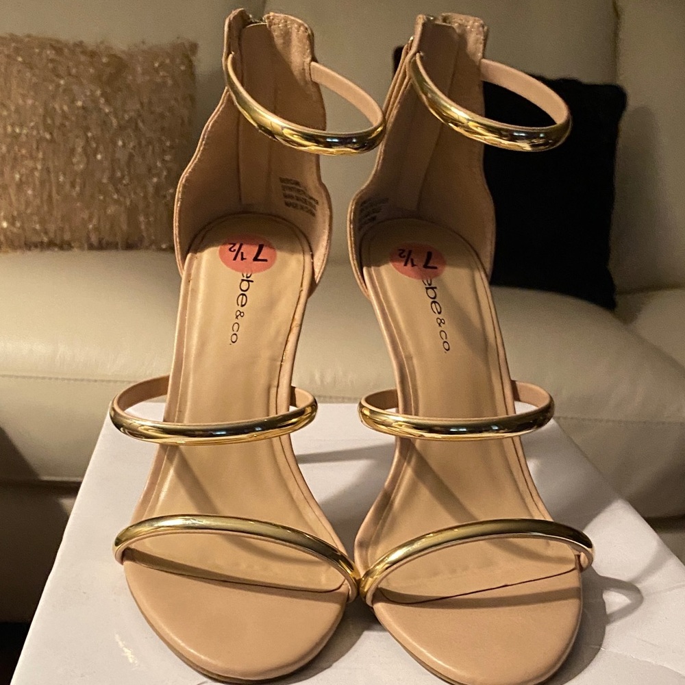 Stylish Gold and Tan Heels by BeBe . Never worn new/ without the tags.